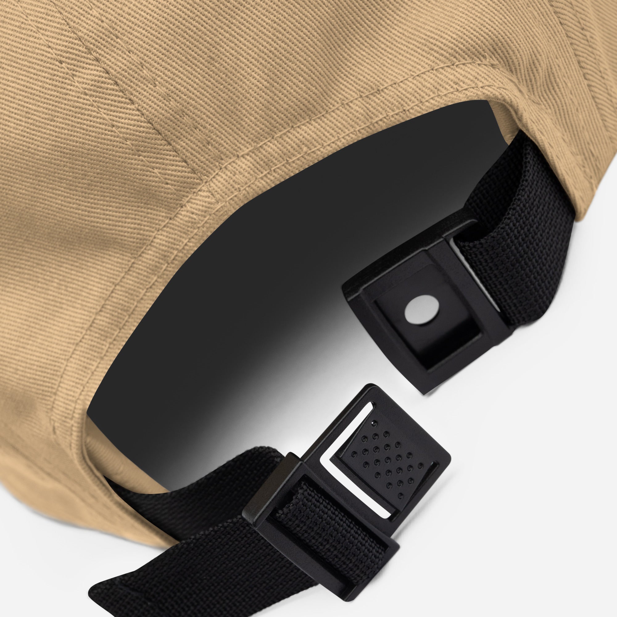 Close-up of khaki Ratbag Moto Five Panel Cap adjustable strap buckle