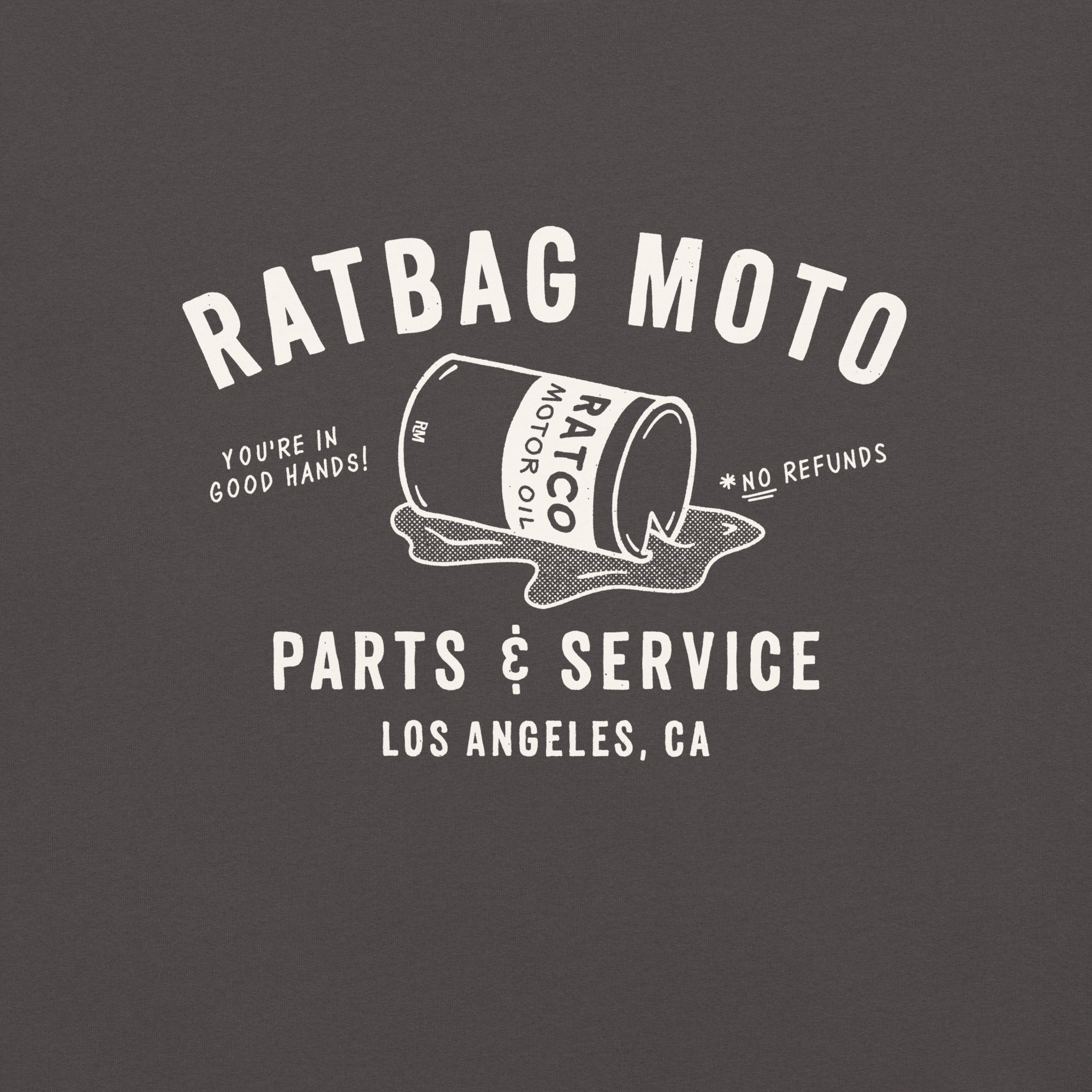 Close-up of hand-drawn Parts & Service lettering and vintage oil can graphic printed on graphite tee