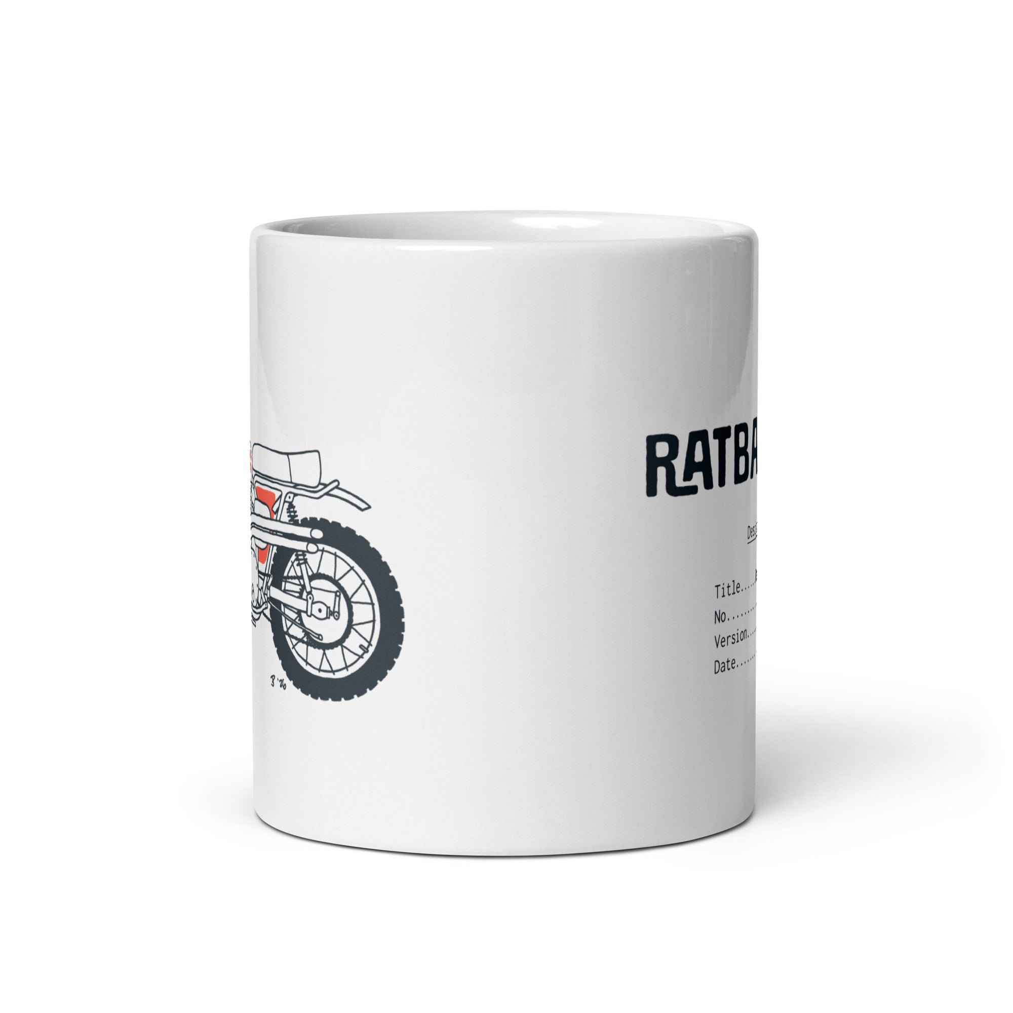 Angled view of Desert Sled Mug showing motorcycle artwork and Ratbag Moto logo design